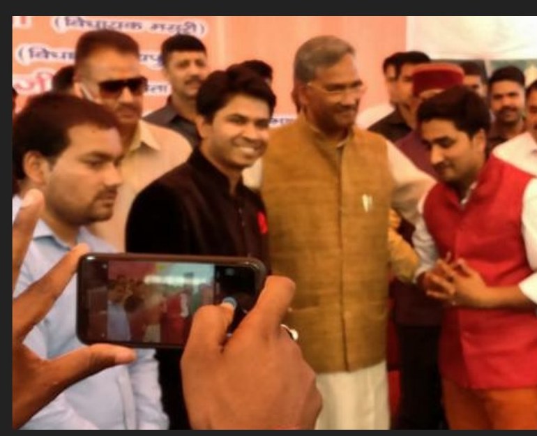 Somnath at an event with the CM of Uttarakhand